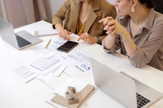 retired woman consulting with a tax professional