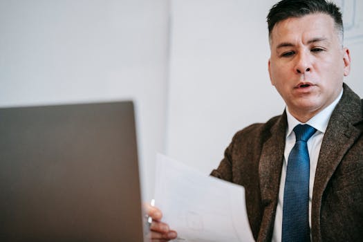 Image of a retired man speaking with a mortgage advisor