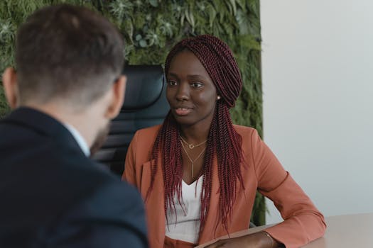 retired professional mentoring younger colleague