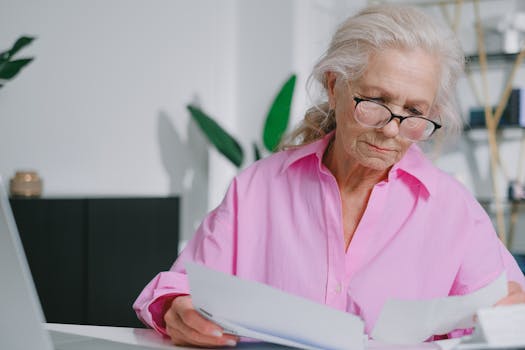 retired person working on laptop