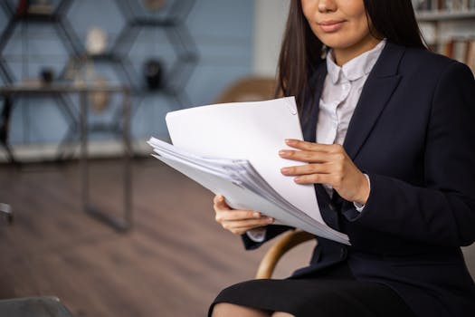 retiree smiling while reviewing mortgage papers