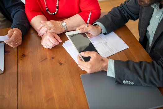 financial advisor meeting with retired client