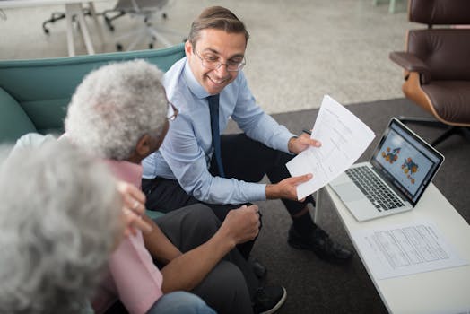 senior couple discussing finances with a financial advisor