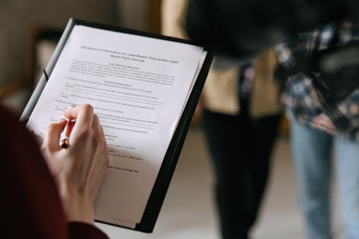 lawyer discussing mortgage documents with a retired couple