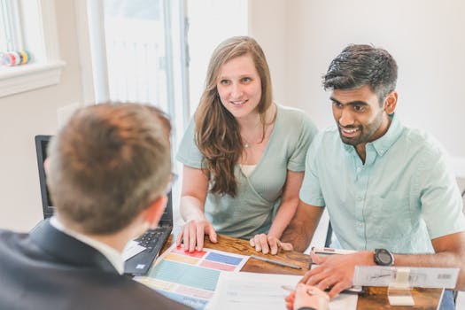 A retired couple reviewing mortgage documents