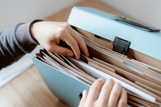 stack of organized financial documents