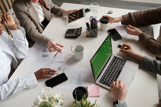 calculator and mortgage documents on a table