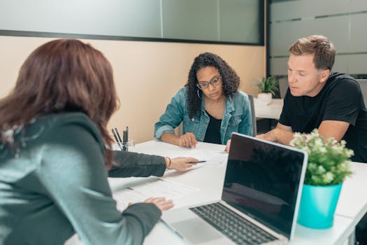 retired couple discussing finances with family member