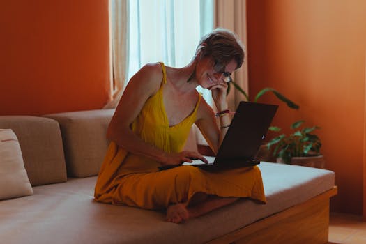 senior woman using laptop for online mortgage application