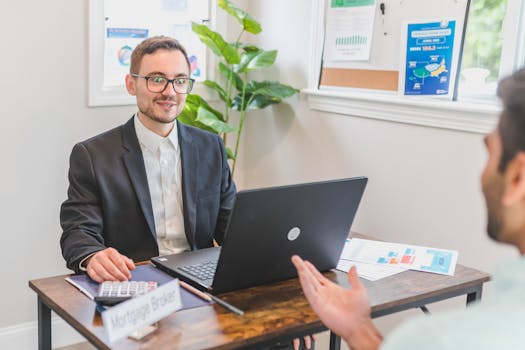 financial advisor explaining mortgage options to senior client