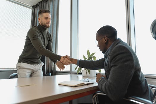 handshake between two people