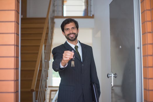 retiree smiling while holding house keys