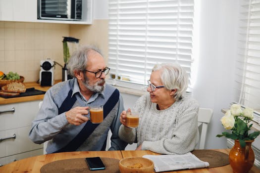 senior couple reviewing their budget at the kitchen table