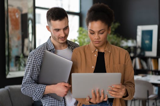 person comparing mortgage rates on laptop