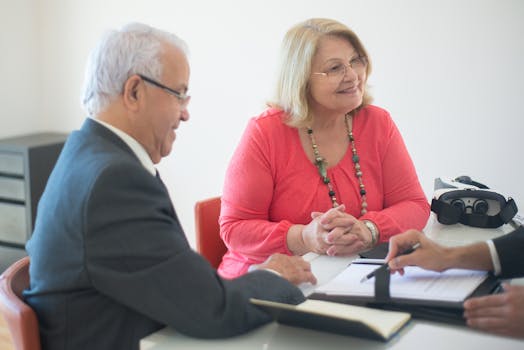 senior couple discussing mortgage options with a financial advisor