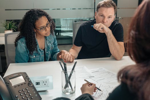 A family discussing financial plans with an advisor