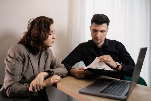 retired couple reviewing mortgage documents