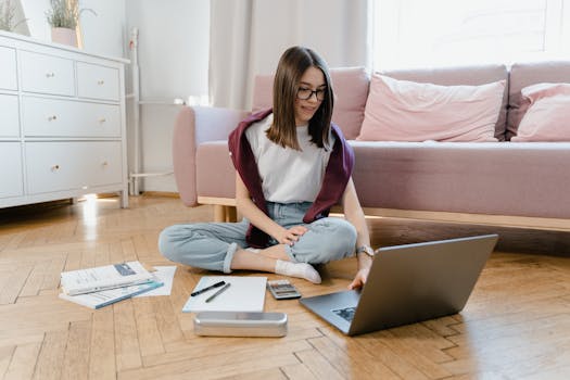 older woman using a laptop to calculate mortgage payments