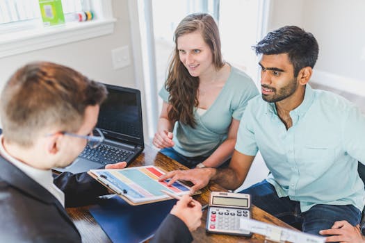 financial advisor discussing mortgage options with retired couple