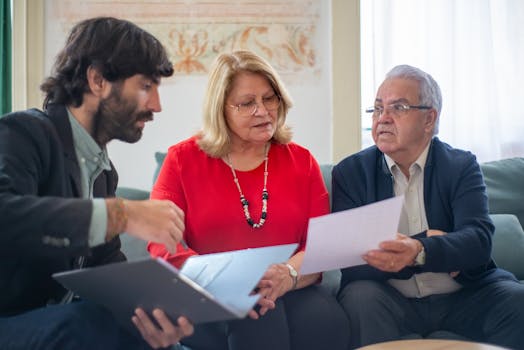 senior couple discussing finances with advisor