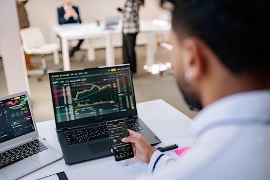 retiree using a laptop to calculate finances