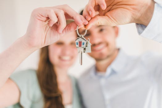 hand holding keys to a new home