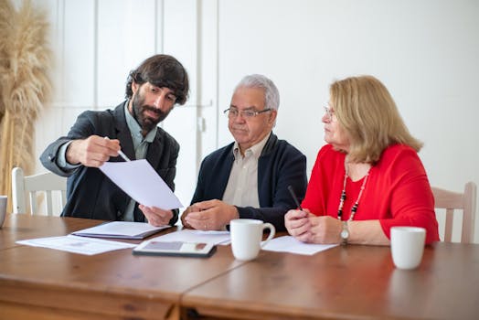 financial advisor meeting with a retired couple