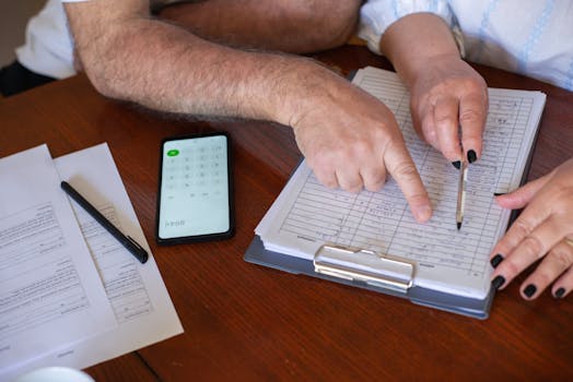 retired couple reviewing financial documents