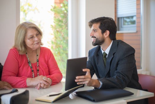 financial advisor helping a retiree with a budget