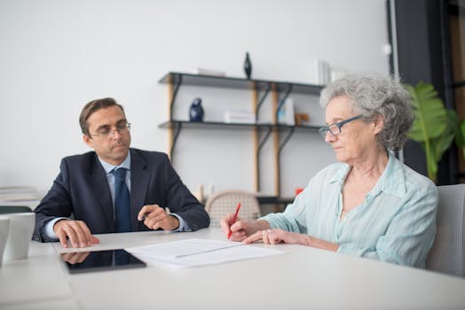 financial advisor meeting with retired client