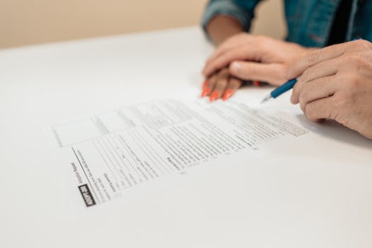 older couple signing legal documents