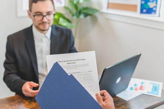 veteran reviewing mortgage documents at a desk