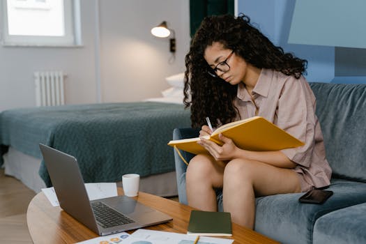 person using laptop to search property records