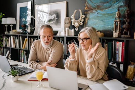 retired couple discussing finances at home