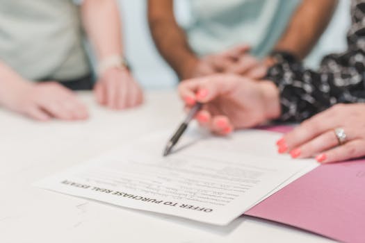 man reviewing property documents with a broker