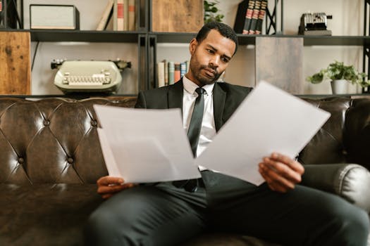 retiree smiling while reviewing tax documents