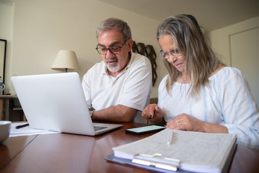 senior couple discussing finances at home