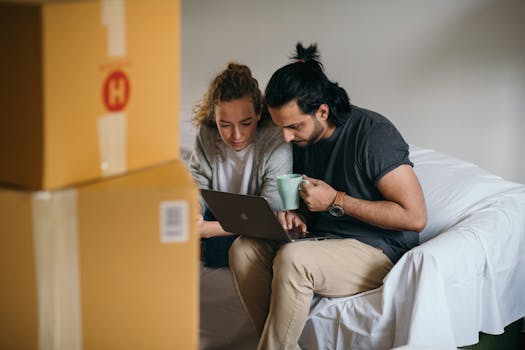 Retired couple using a laptop to explore mortgage options