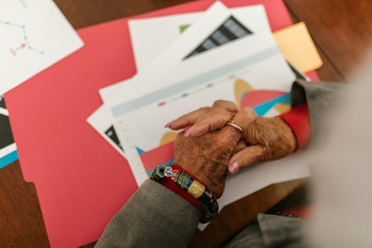 elderly woman reviewing financial documents