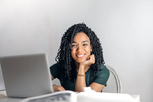 woman using laptop to compare mortgage rates