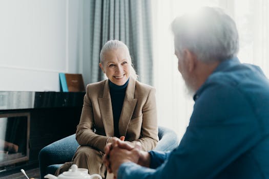 smiling senior couple budgeting together