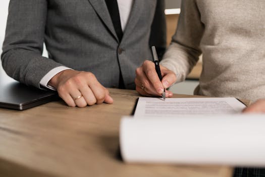 retirees signing a legal agreement