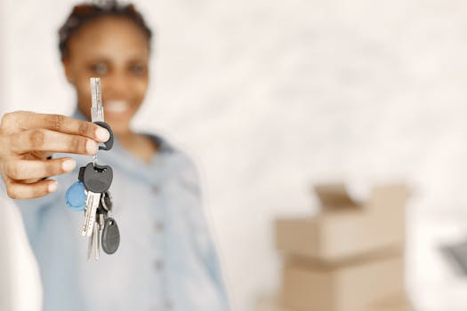 veteran holding keys to new home